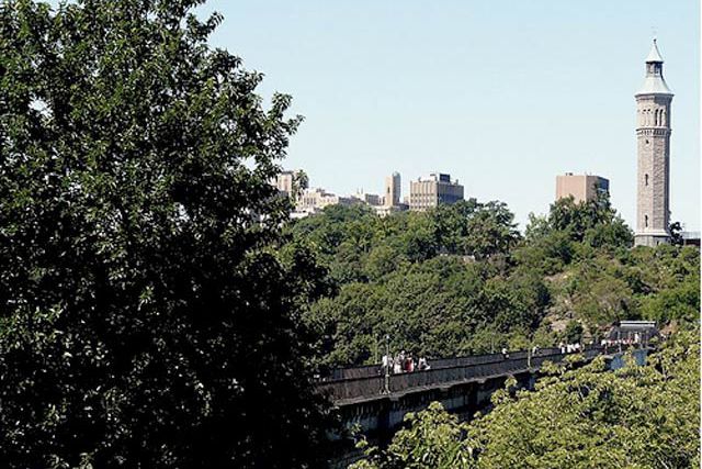 One view of the High Bridge and Water Tower, from across the Harlem River in Highbridge Park in the Bronx. "There are two Highbridge Parks - one in Manhattan and one in the Bronx - the High Bridge will connect the parks."